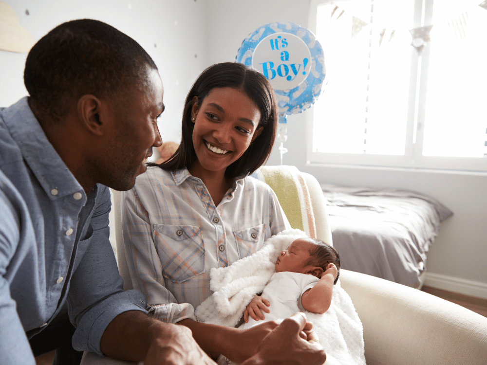 couple with newborn baby