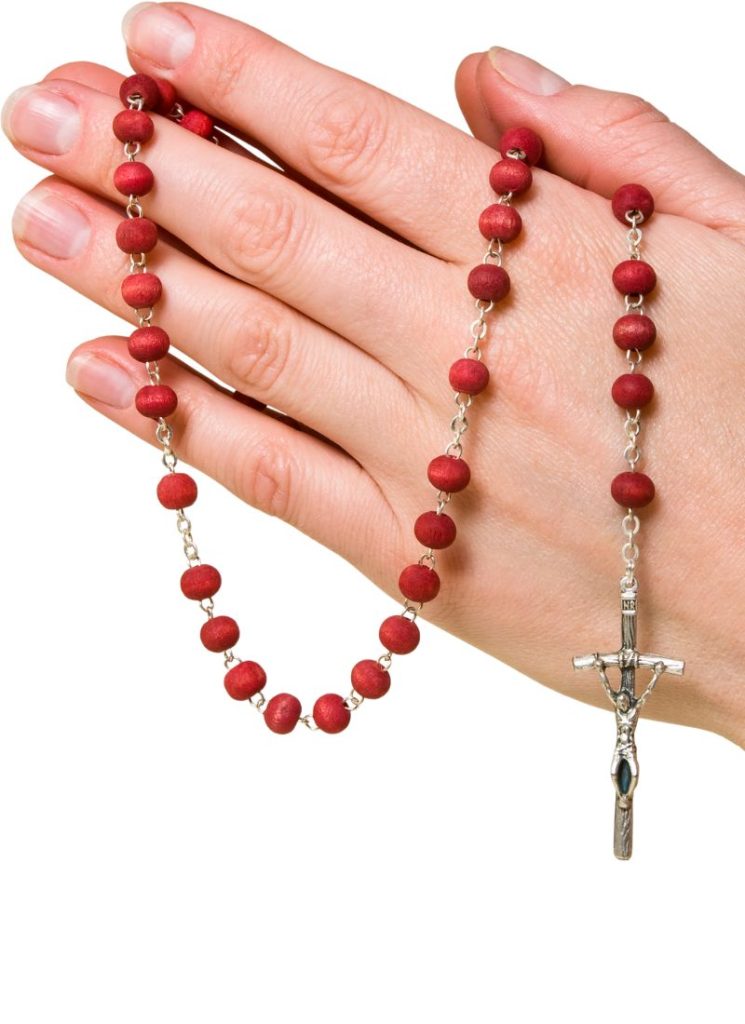 prayer beads with hands